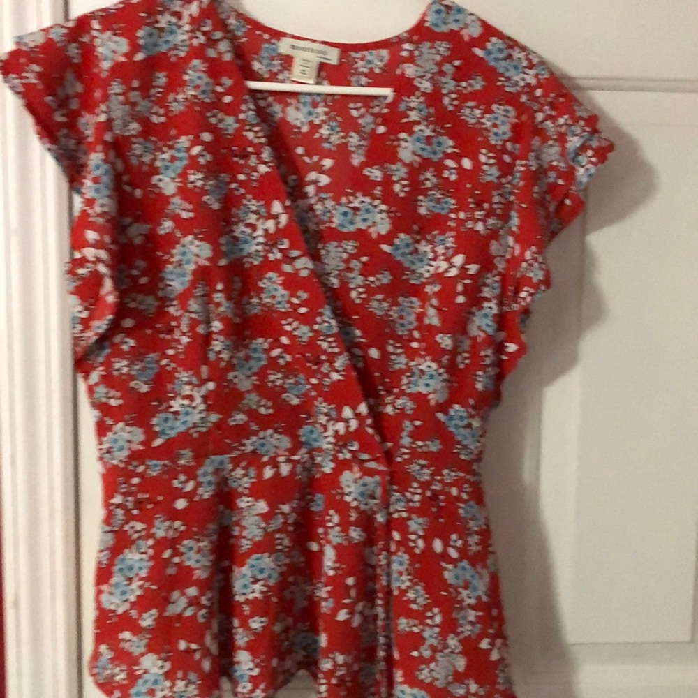 Red floral blouse